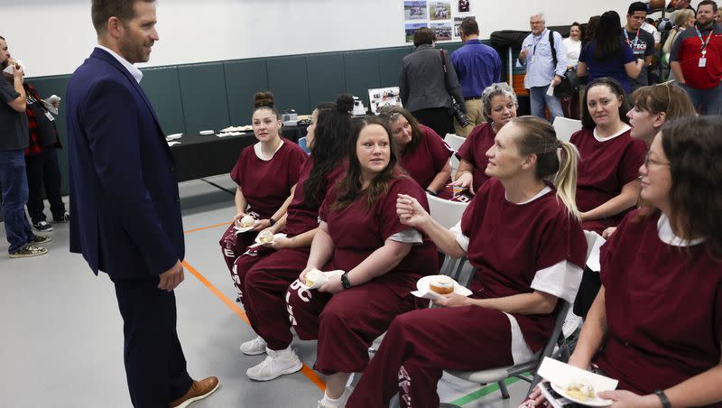 Executive director Brian Redd speaks with inmates at the Utah State Correctional Facility in Salt Lake City on Friday. The facility partnered to bring new certification programs to female prisoners.