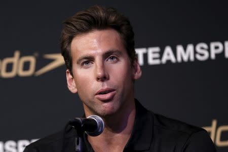 Olympic swimmer Grant Hackett of Australia speaks at a news conference at an event to unveil the new line of Speedo LZR Racer X swim suits in the Manhattan borough of New York City, December 15, 2015. REUTERS/Mike Segar