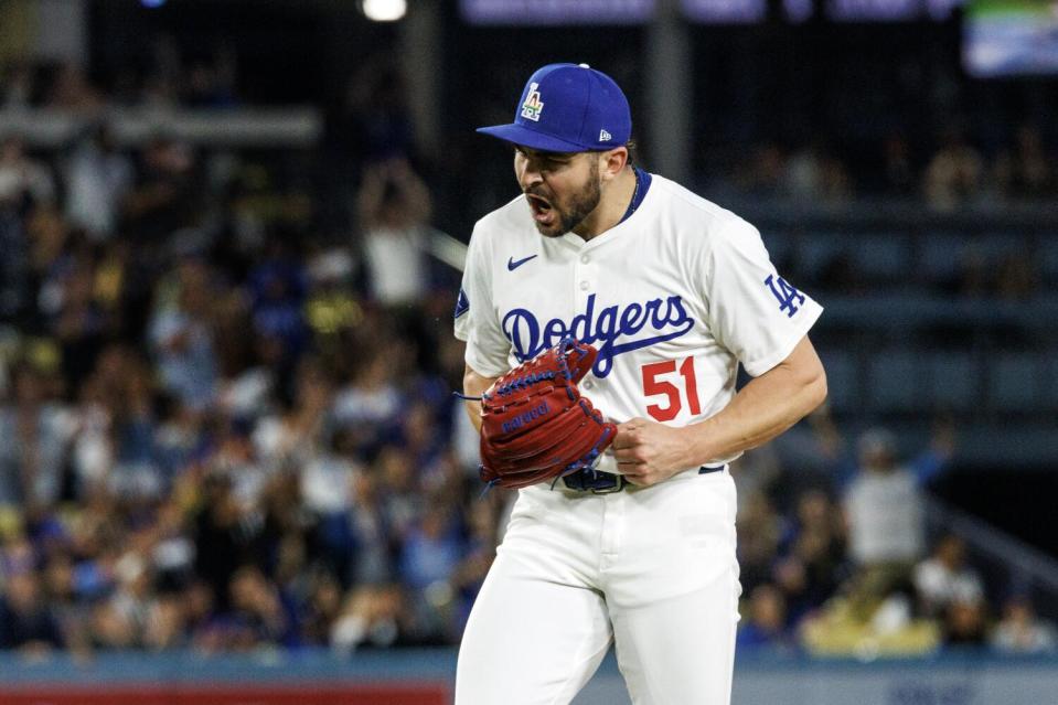 Dodgers relief pitcher Alex Vesia reacts after earning a save to close out a 4-3 victory over the Royals on Friday.