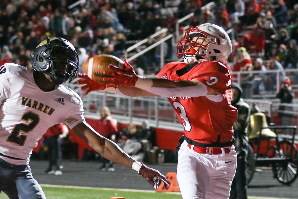 Center Grove Noah Coy (3) with the end zone reception during the IHSAA Class 6A regional football tourney as Center Grove vs Warren Central, Nov 11, 2022; Greenwood, IN, at Center Grove High School.