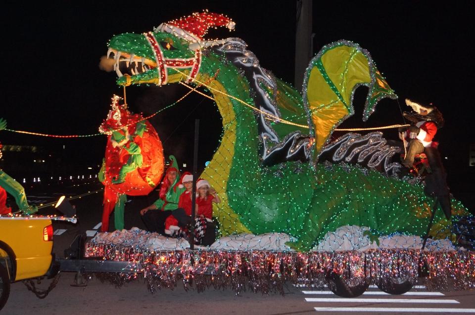 A colorful lighted dragon float rolls down the road during the 2013 Melbourne Light Parade.