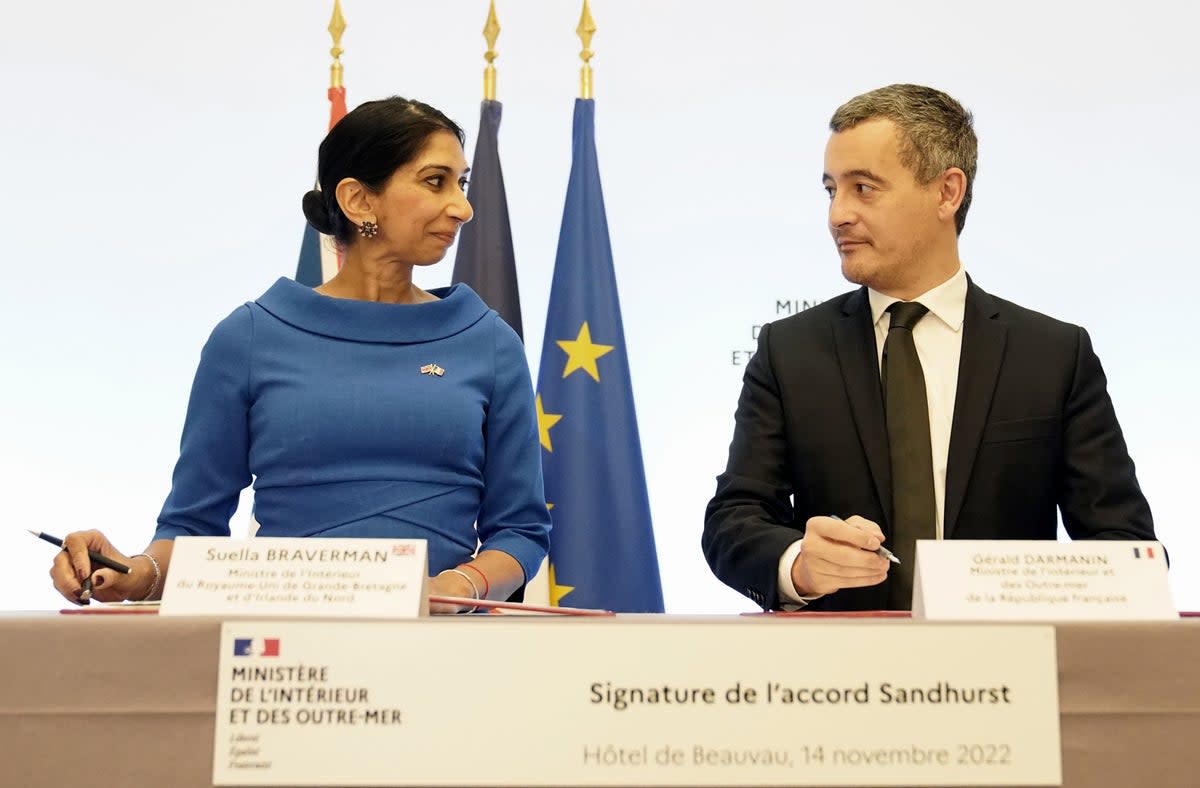 Former British home secretary Suella Braverman with French interior minister Gerald Darmanin (PA)