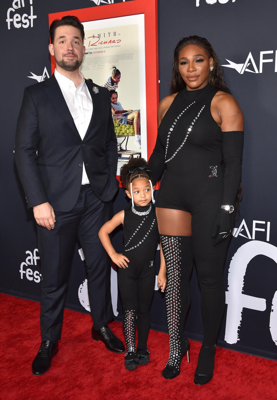 Alexis Ohanian (L), US tennis player Serena Williams (C) and daughter Alexis Olympia Ohanian Jr. attend the AFI Fest premiere of "King Richard" at TCL Chinese Theatre in Hollywood, California, on November 14, 2021. (Photo by LISA O'CONNOR / AFP) (Photo by LISA O'CONNOR/AFP via Getty Images)