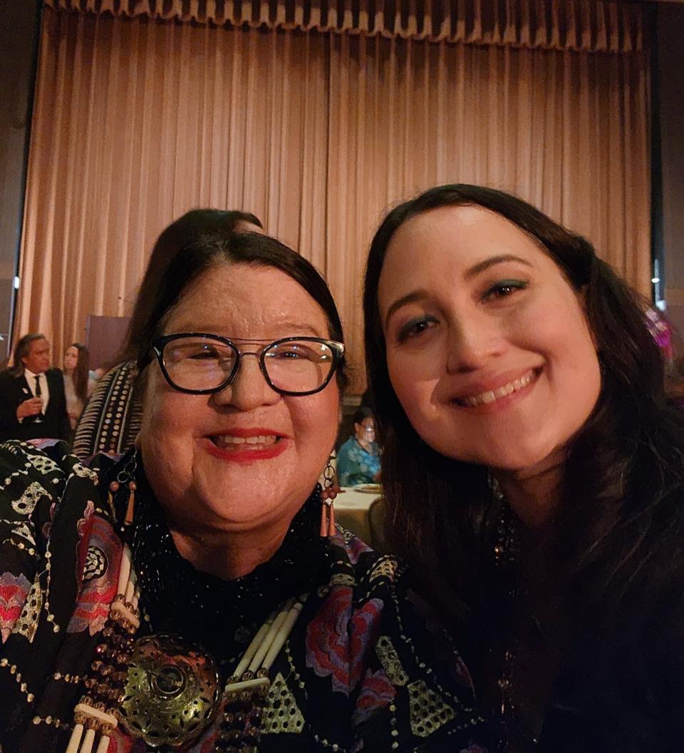 Osage Nation citizen Danette Daniels, left, poses for a photo with "Killers of the Flower Moon" star Lily Gladstone on July 8 at a premiere event for the film at the Osage Casino in Tulsa.