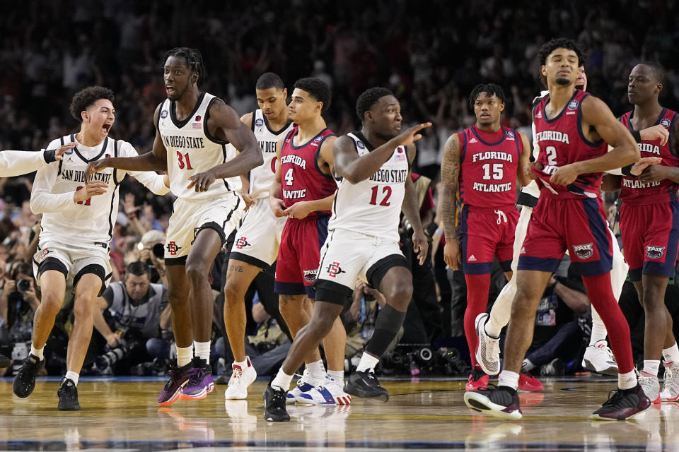 San Diego State celebrates after their win against Florida Atlantic in a Final Four college basketball game in the NCAA Tournament on Saturday, April 1, 2023, in Houston. (AP Photo/Brynn Anderson)