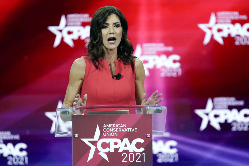 FILE - In this Feb. 27, 2021 file photo, South Dakota Gov. Kristi Noem speaks at the Conservative Political Action Conference (CPAC) in Orlando, Fla. Repealing statewide mask mandates and criticizing the Biden administrationâ€™s unemployment-based formula for distributing billions in federal aid has put Republican governors and their approach to handling the coronavirus pandemic back in the spotlight. (AP Photo/John Raoux)