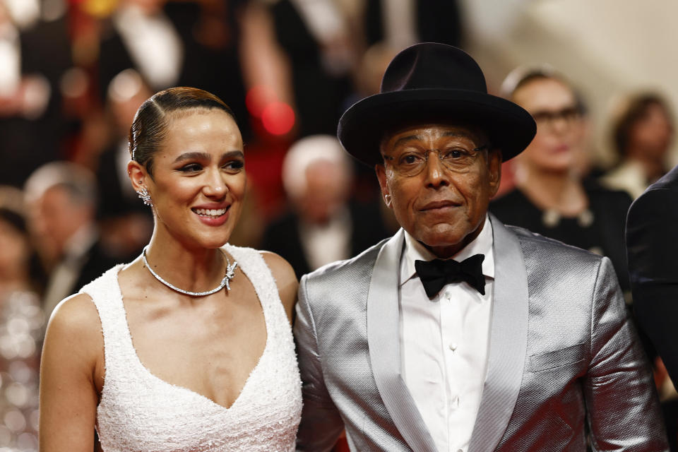 British actress Nathalie Emmanuel (L) and US actor Giancarlo Esposito leave after the screening of the film 