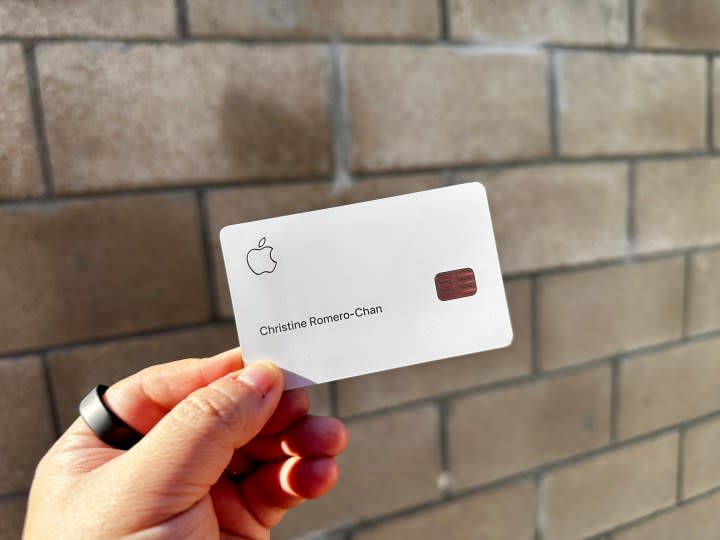 Apple Card held in hand