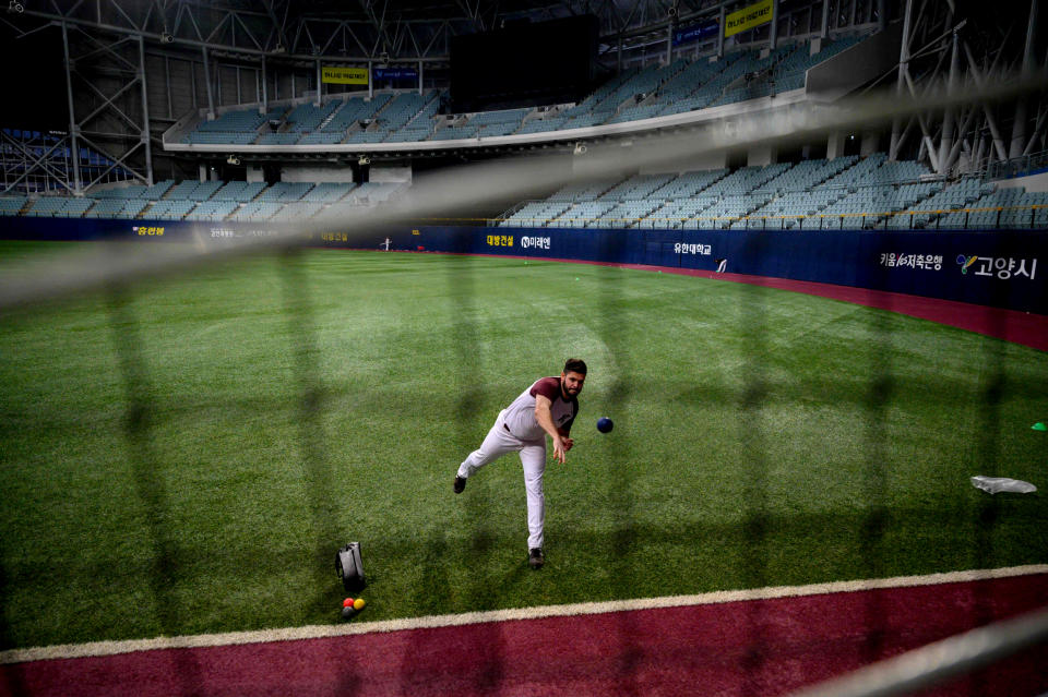 Image: Kiwoom Heroes pitcher Jake Brigham attends a training session at Gocheok Sky Dome in Seoul on April 26, 2020. (Ed Jones / AFP - Getty Images file)