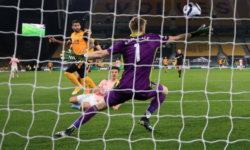 Wolverhampton Wanderers’ Willian Jose sweeps the ball past Sheffield United goalkeeper Aaron Ramsdale to open the scoring.