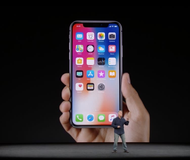 Apple’s Phil Schiller debuts the iPhone X at the company’s new headquarters in Cupertino, California.