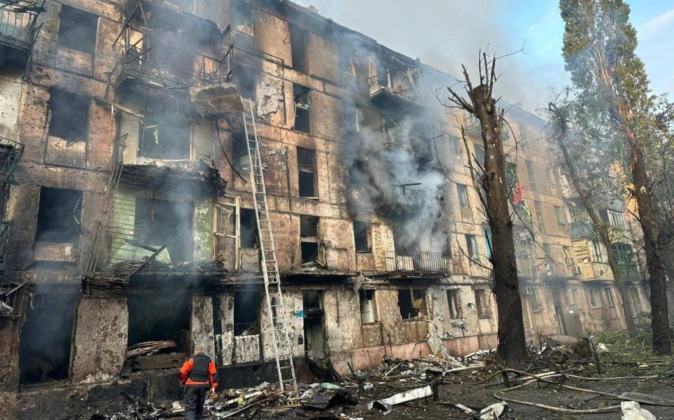 A residential building heavily damaged by a Russian missile strike in Kryvyi Rih, Dnipropetrovsk region - DNIPROPETROVSK REGIONAL MILITARY ADMINISTRATION/via REUTERS