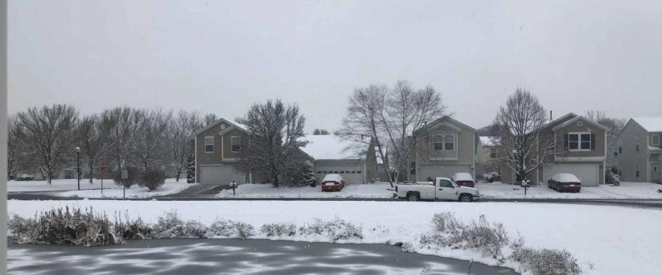 Midwest neighborhood in Indianapolis, Indiana area after a snowstorm.