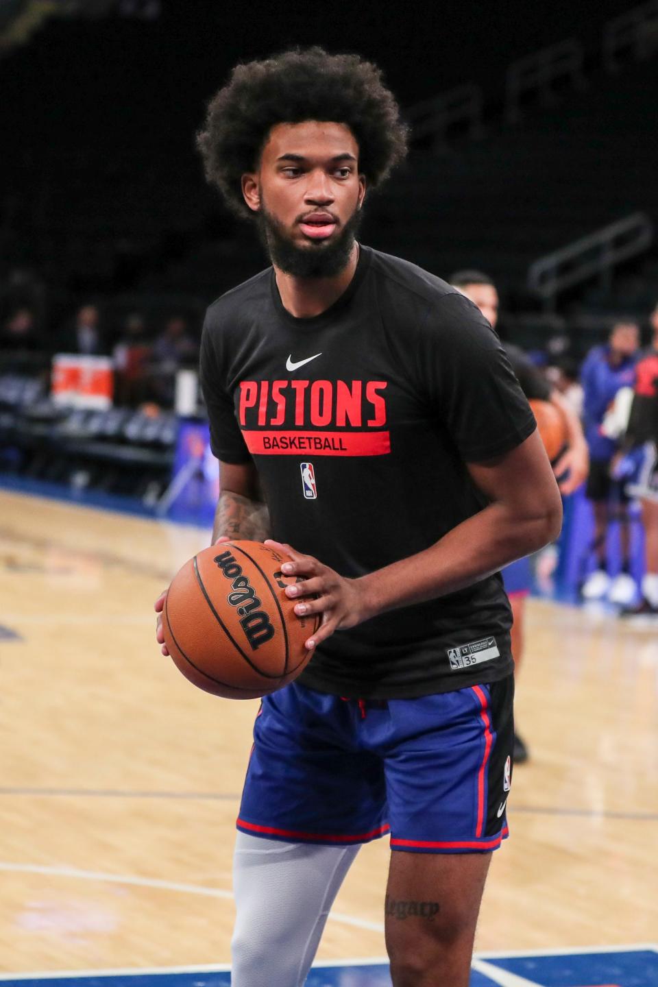 Pistons forward Marvin Bagley takes warmups prior to the preseason game against the Knicks at Madison Square Garden on Tuesday, Oct. 4, 2022.
