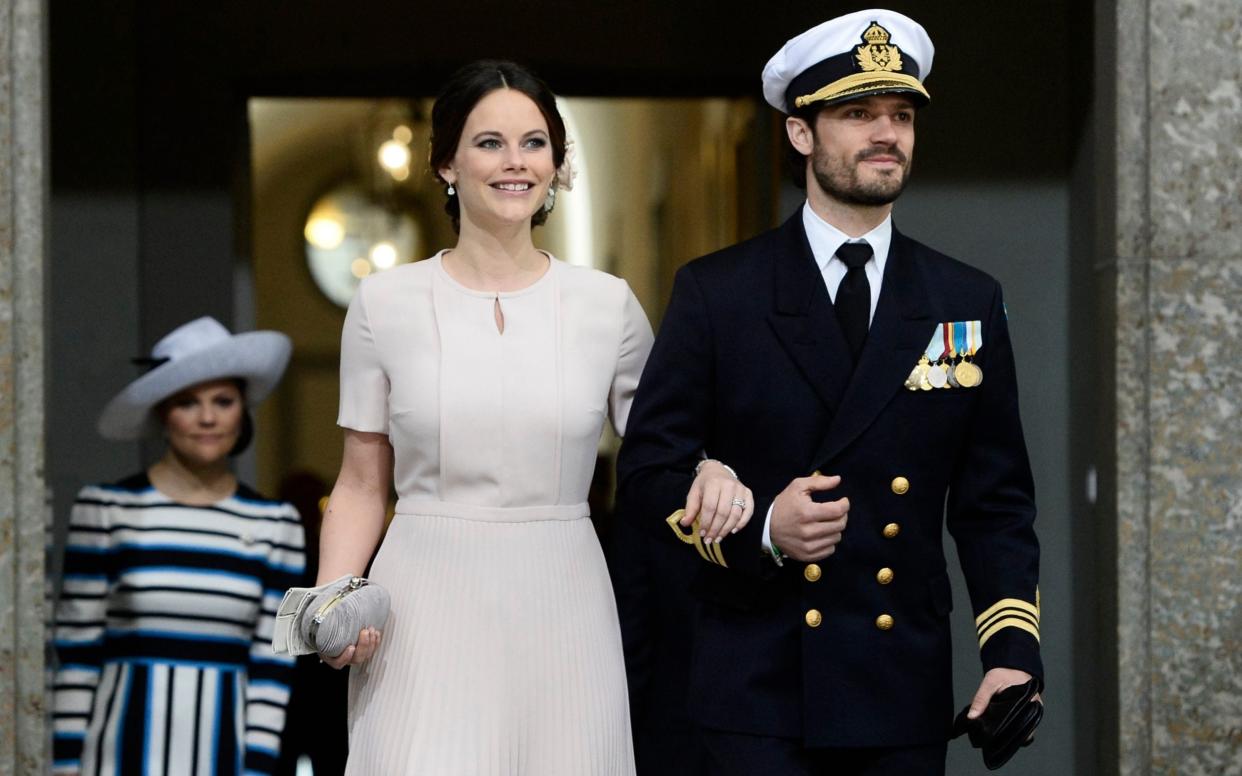 Princess Sofia and Prince Carl Philip arrive for the Te Deum thanksgiving service in the Royal Chapel  - AFP