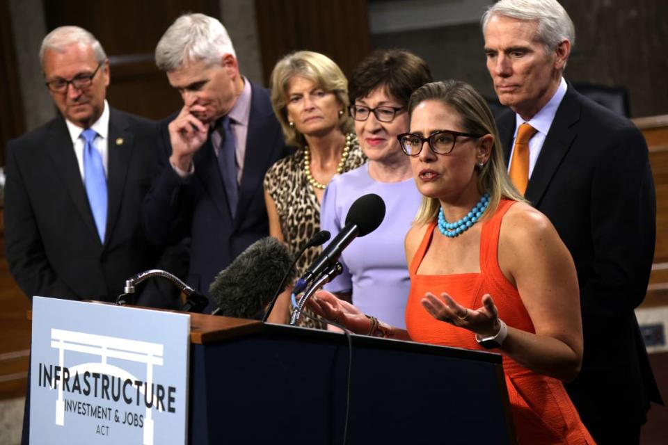 <div class="inline-image__caption"><p>Sen. Sinema speaks to the media after a procedural vote for the infrastructure framework on July 28, 2021 in Washington, DC.</p></div> <div class="inline-image__credit">Alex Wong/Getty Images</div>