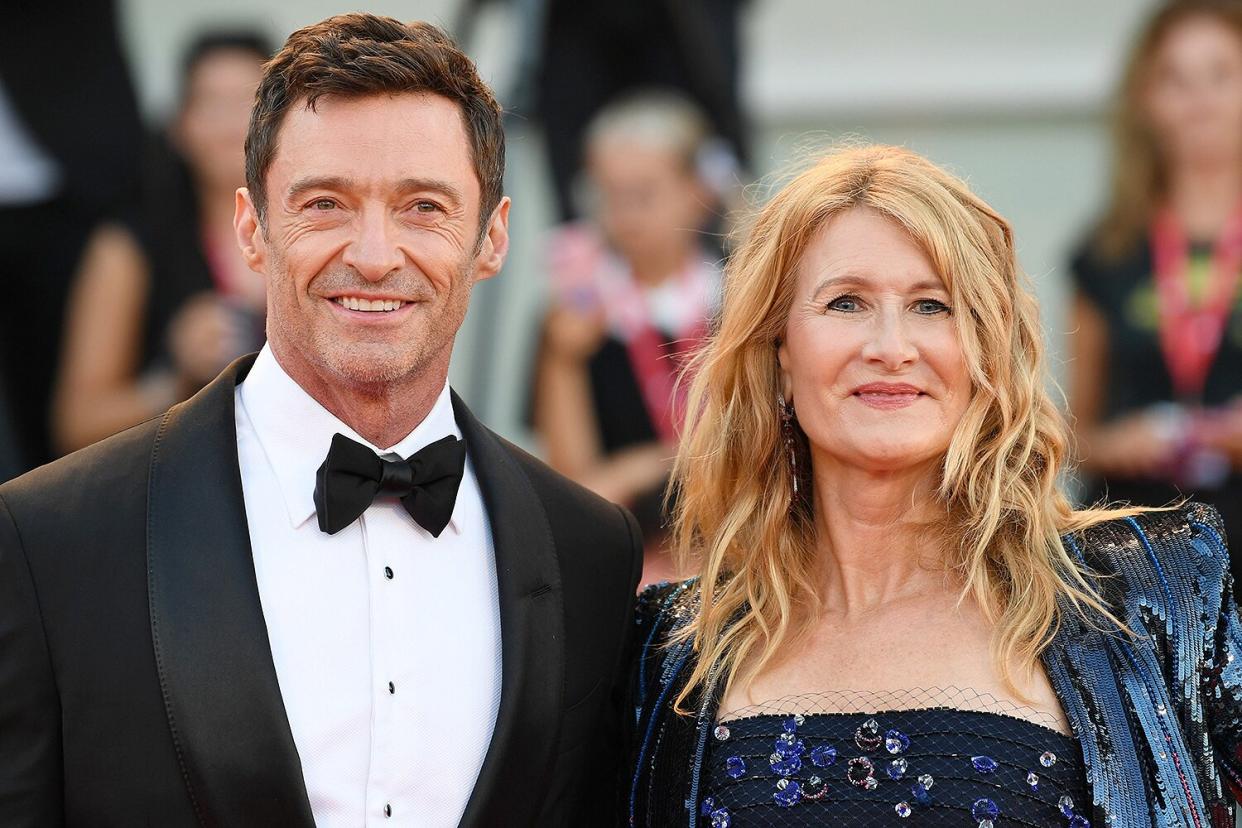 Actor Hugh Jackman L and actress Laura Dern pose on the red carpet for the premiere of the film "The Son" during the 79th Venice International Film Festival in Venice, Italy, on Sept. 7, 2022.