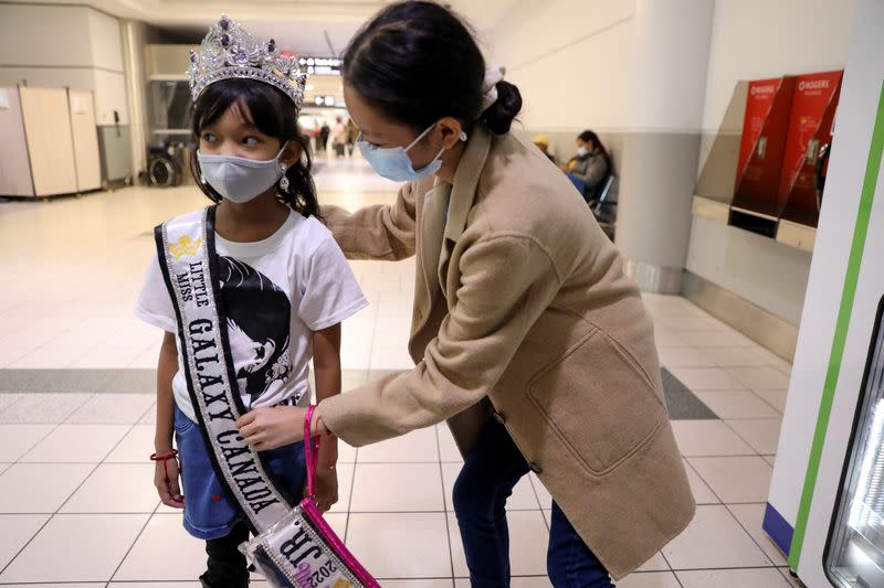 Exiled Myanmar beauty queen Han Lay arrives at Toronto Pearson International Airport in Mississauga