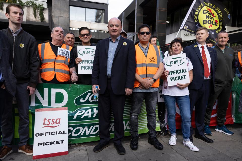 RMT boss Mick Lynch with rail workers on strike (Getty Images)