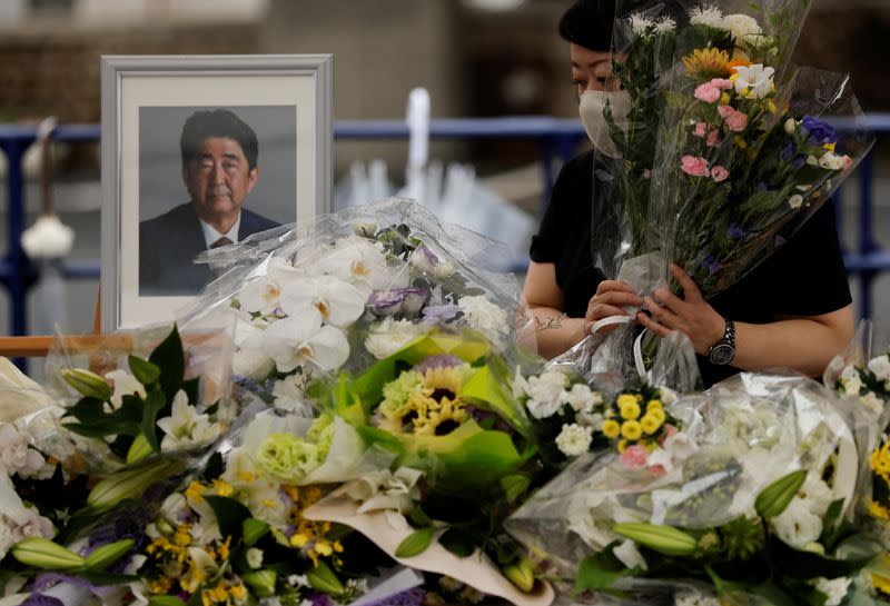 Mourners gather at the altar for the late former Japanese Prime Minister Shinzo Abe, in Tokyo