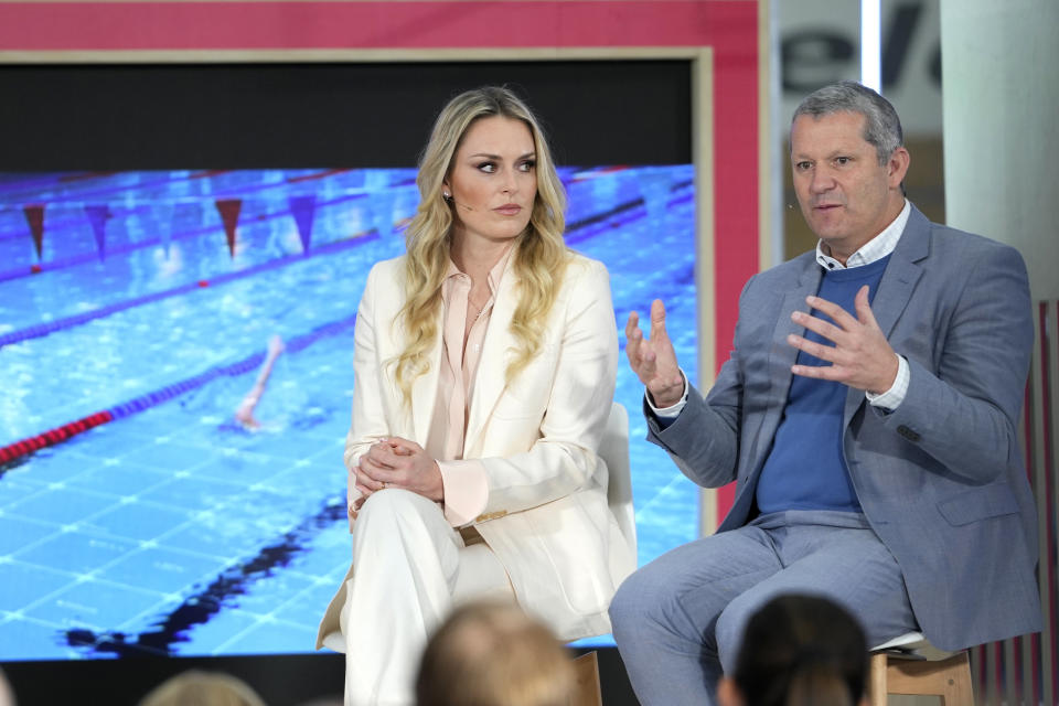 Lindsey Vonn, Olympic Skiing Champion and Christoph Schell Executive Vice President and Chief Commercial Officer, Intel Corporation, speak at the International Olympic Committee launch of the Olympic AI Agenda at Lee Valley VeloPark, in London, Friday, April 19, 2024. The IOC will be presenting the envisioned impact that artificial intelligence can deliver for sport, and how the IOC intends to lead on the global implementation of AI within sport. (AP Photo/Kirsty Wigglesworth)