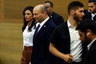 Israeli Prime Minister Naftali Bennett delivers a statement to the media, telling reporters he will not be running in Israel’s next election, at the Knesset, the Israeli Parliament, in Jerusalem