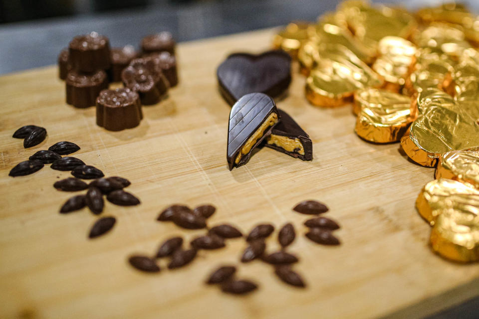 An assortment of chocolates sit on a board at Zero Tolerance Coffee and Chocolate in Oklahoma City on Wednesday, Sept. 28, 2022.