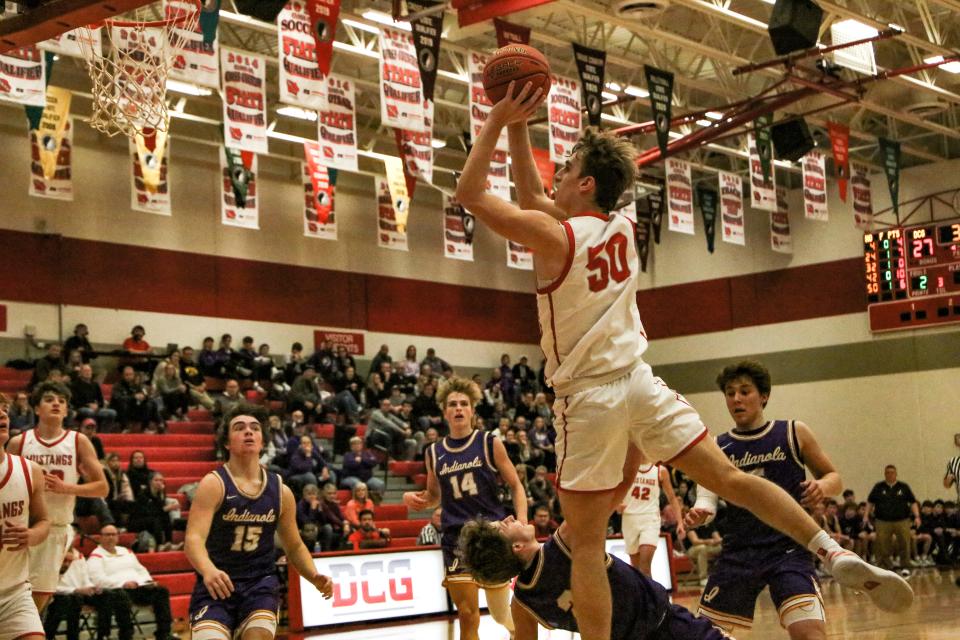 DCG's Calix Cahill puts up a shot against Indianola on Friday, Jan. 6, 2023, in Grimes.