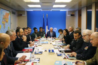 French President Emmanuel Macron, third right, chairs a meeting concerning the COVID-19 situation in France, Saturday, Feb. 29, 2020 at the Elysee Palace in Paris. (Jean-Claude Coutausse, Pool via AP)