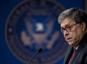 U.S. Attorney General William Barr speaks at the Gerald R. Ford Presidential Museum in Grand Rapids, Mich., Thursday, July 16, 2020. The United States has become overly reliant on Chinese goods and services, including face masks, medical gowns and other protective equipment designed to curb the spread of the coronavirus, Attorney General Barr said Thursday. (Nicole Hester/Mlive.com/Ann Arbor News via AP)