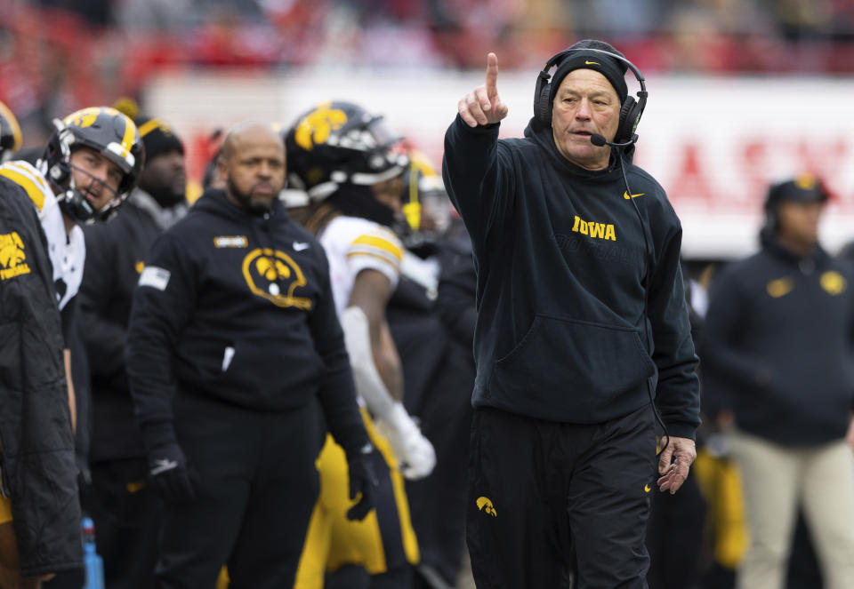 FILE - Iowa head coach Kirk Ferentz yells to his team as they play against Nebraska during the first half of an NCAA college football game Friday, Nov. 24, 2023, in Lincoln, Neb. Iowa defeated Nebraska 13-10. (AP Photo/Rebecca S. Gratz, File)