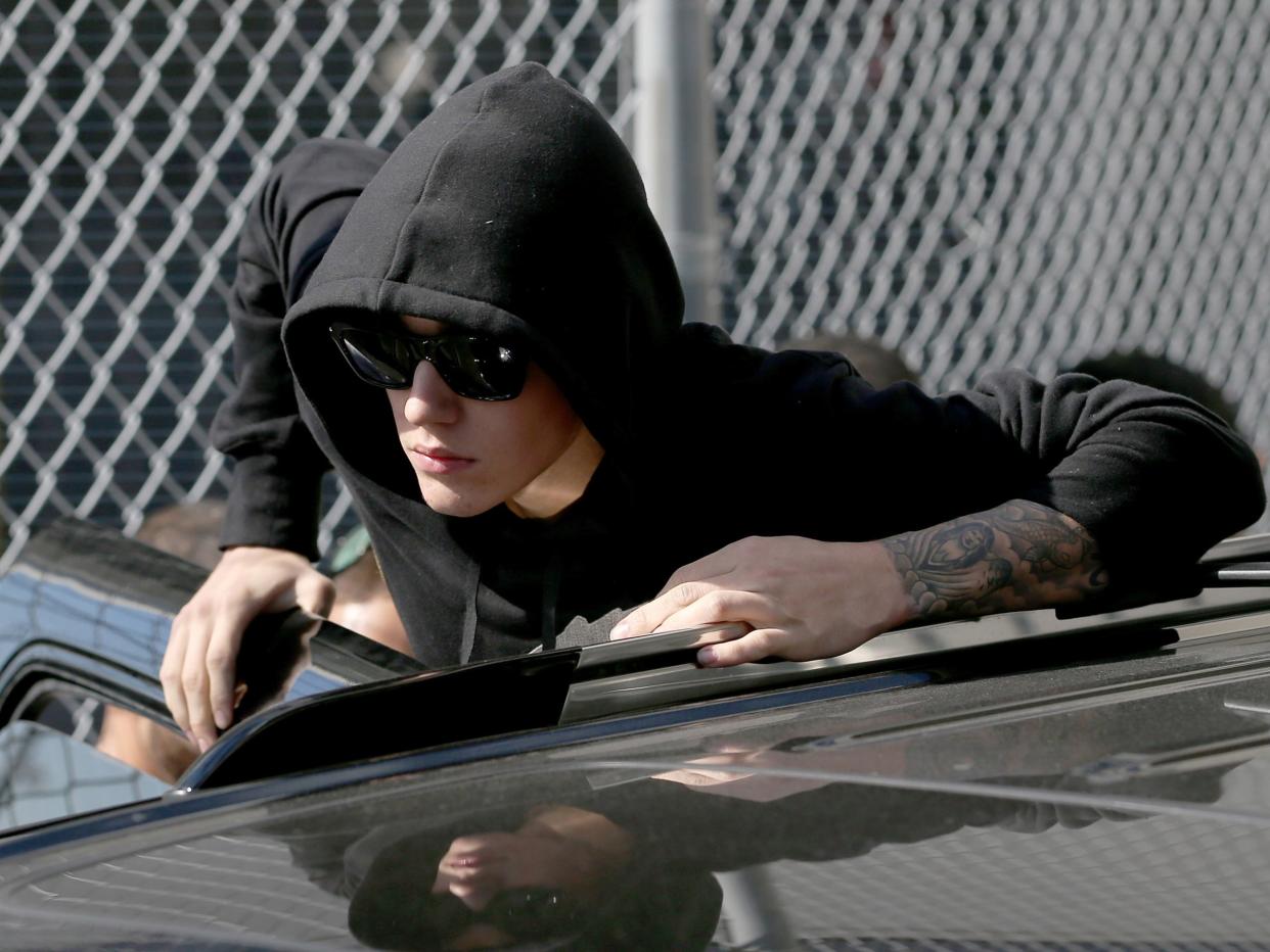 Justin Bieber exiting the a Miami correctional centre following his arrest on 23 January, 2014 (Getty Images)