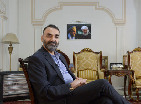 Atta Mohammad Noor, Governor of the Balkh province, poses for a photo before an interview in Mazar-i-Sharif, Afghanistan January 1, 2018. REUTERS/Anil Usyan