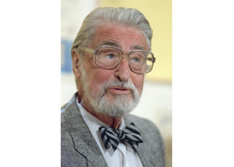 FILE — American author, artist and publisher Theodor Seuss Geisel, also known by his pen name Dr. Seuss, appears at an event in Dallas, April 3, 1987. Seuss Enterprises, the company that owns the Dr. Seuss intellectual property, is releasing a sequel to the iconic children's book "How the Grinch Stole Christmas!" The new book is to be called "How the Grinch Lost Christmas!" (AP Photo/File)