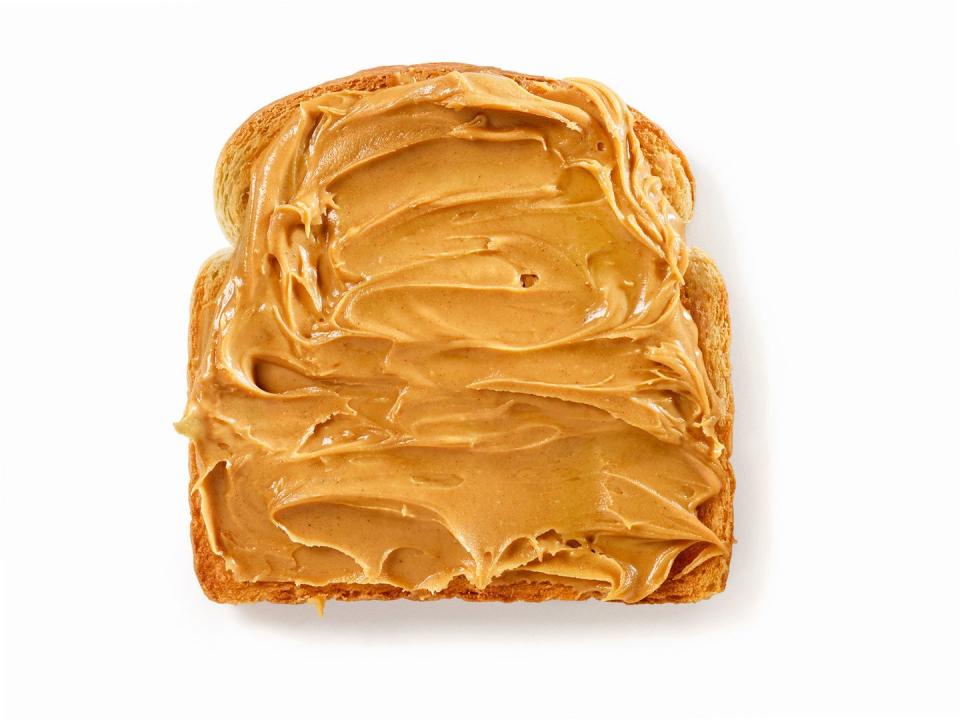 Natural peanut butter on Ezekiel toast