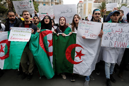 FILE PHOTO: Students shout slogans during a protest calling on President Abdelaziz Bouteflika to quit, in Algiers, Algeria March 19, 2019. REUTERS/Zohra Bensemra