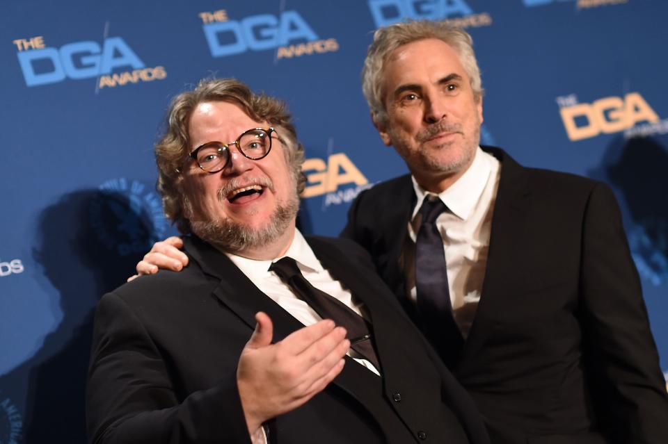 Director Alfonso Cuaron (R) poses next to director Guillermo Del Toro after receiving the award for Outstanding Directorial Achievement in Feature Film for "Roma" in the press room during the 71st Annual Directors Guild Of America (DGA) Awards at the Ray Dolby Ballroom in Hollywood on February 2, 2019. (Photo by Valerie MACON / AFP)        (Photo credit should read VALERIE MACON/AFP/Getty Images)