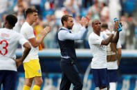 Soccer Football - World Cup - Group G - England vs Panama - Nizhny Novgorod Stadium, Nizhny Novgorod, Russia - June 24, 2018 England manager Gareth Southgate and Ashley Young applaud fans after the match REUTERS/Matthew Childs