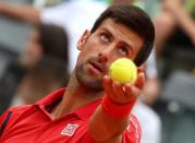 Tennis - Italy Open - Novak Djokovic of Serbia v Stephane Robert of France - Rome, Italy - 11/5/16 Djokovic serves. REUTERS/Stefano Rellandini