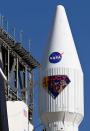 The capsule with NASA's Lucy spacecraft, atop a United Launch Alliance Atlas 5 rocket, stands at Pad-41 at Cape Canaveral Space Force Station