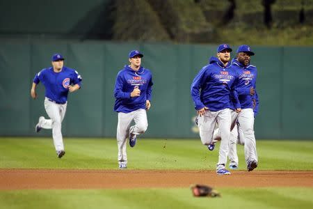 Oct 7, 2015; Pittsburgh, PA, USA; The Chicago Cubs bullpen runs in as the benches clear after Chicago Cubs starting pitcher Jake Arrieta (49) was hit by a Pittsburgh Pirates pitch during the seventh inning in the National League Wild Card playoff baseball game at PNC Park. Charles LeClaire-USA TODAY Sports