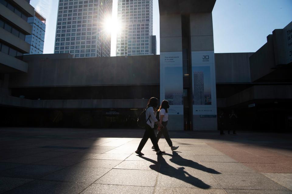 Commuters make their way though the Journal Square PATH Terminal in Jersey City, N.J. on Wednesday June 15, 2022. 