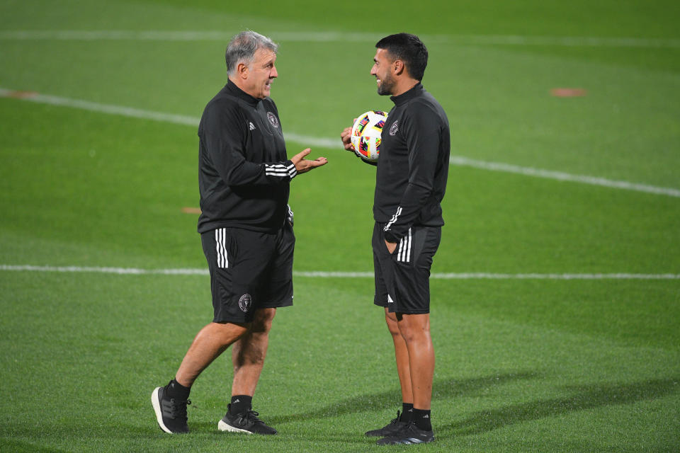 Jan 31, 2024; Riyadh, Riyadh, Saudi Arabia; Inter Miami CF head coach Gerardo Martino talks with assistant coach Javier Morales during a training session ahead of their friendly match against Al-Hilal FC at Al-Shabab FC Stadium. Mandatory Credit: Victor Fraile-USA TODAY Sports