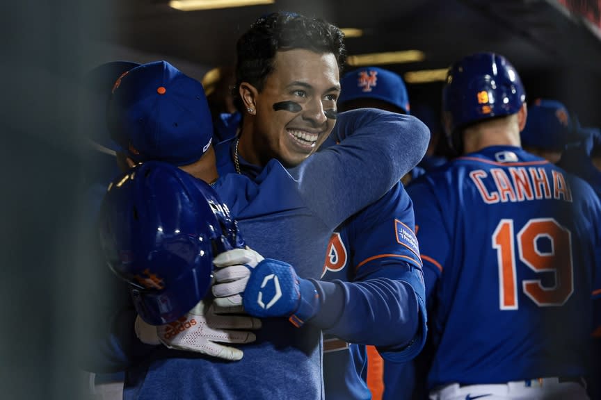 New York Mets third baseman Mark Vientos (27) celebrates with teammates after hitting a two-run home run during the seventh inning against the Tampa Bay Rays at Citi Field.