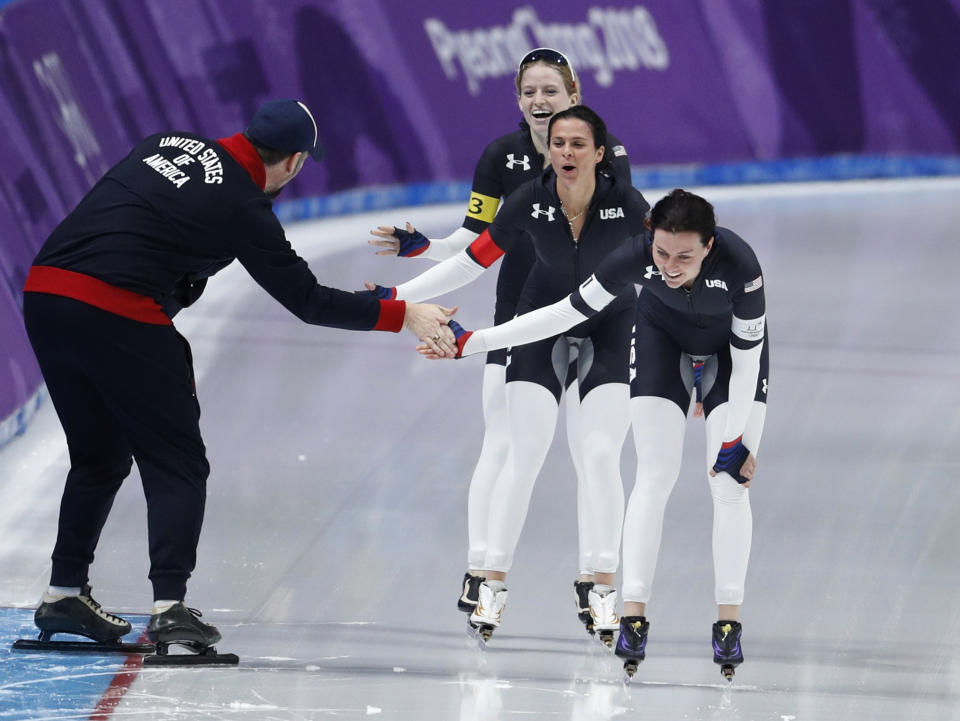 <p>Team U.S.A. with Heather Bergsma, front, Brittany Bowe, center, and Mia Manganello, rear, celebrates with their coach after the quarterfinals of the women’s team pursuit speedskating race at the Gangneung Oval at the 2018 Winter Olympics in Gangneung, South Korea, Monday, Feb. 19, 2018. (AP Photo/John Locher) </p>