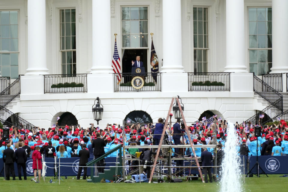 President Donald Trump speaks from the Blue Room Balcony of the White House to a crowd of supporters, Saturday, Oct. 10, 2020, in Washington. / Credit: Manuel Balce Ceneta / AP