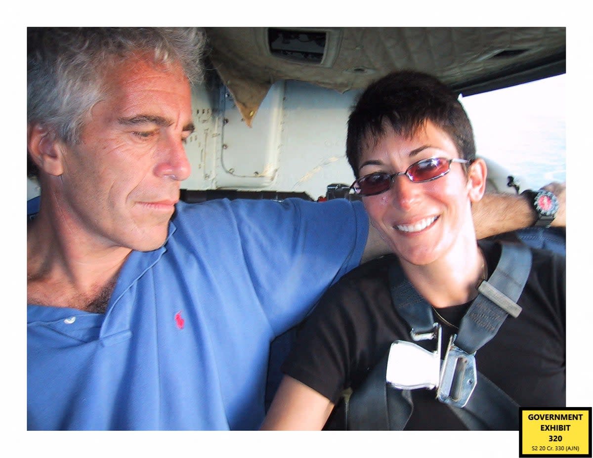 This undated trial evidence image obtained on 8 December 2021, from the US District Court for the Southern District of New York shows British socialite Ghislaine Maxwell and US financier Jeffrey Epstein (US District Court for the Southern District of New York)