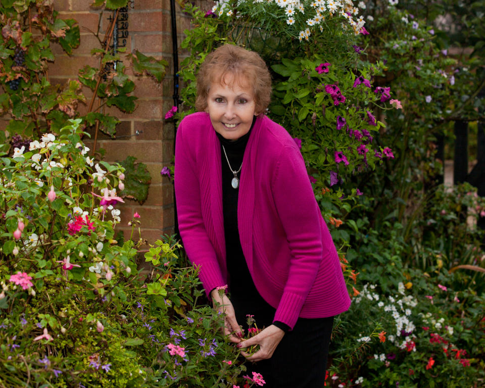 Gina can now walk around her garden without her wheelchair (Fran Dale Photography/PA Real Life)