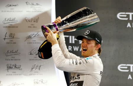 Formula One - F1 - Abu Dhabi Grand Prix 2015 - Yas Marina Circuit, Abu Dhabi, United Arab Emirates - 29/11/15 Mercedes' Nico Rosberg celebrates after winning the race Mandatory Credit: Action Images / Hoch Zwei