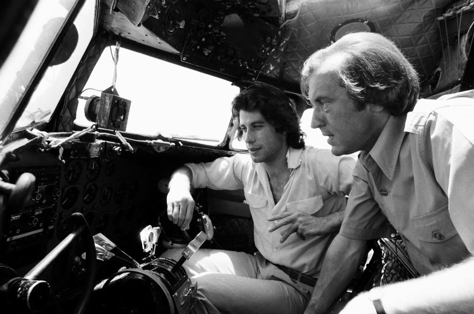 <p>John Travolta shows off his private jet for an interview with David Frost in 1978. </p>